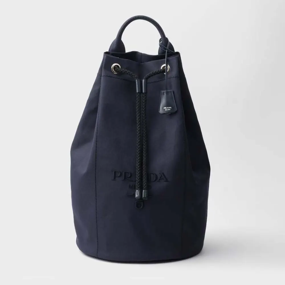 Front view of Prada Unisex Canvas Drawstring Duffle Bag-Navy with closure