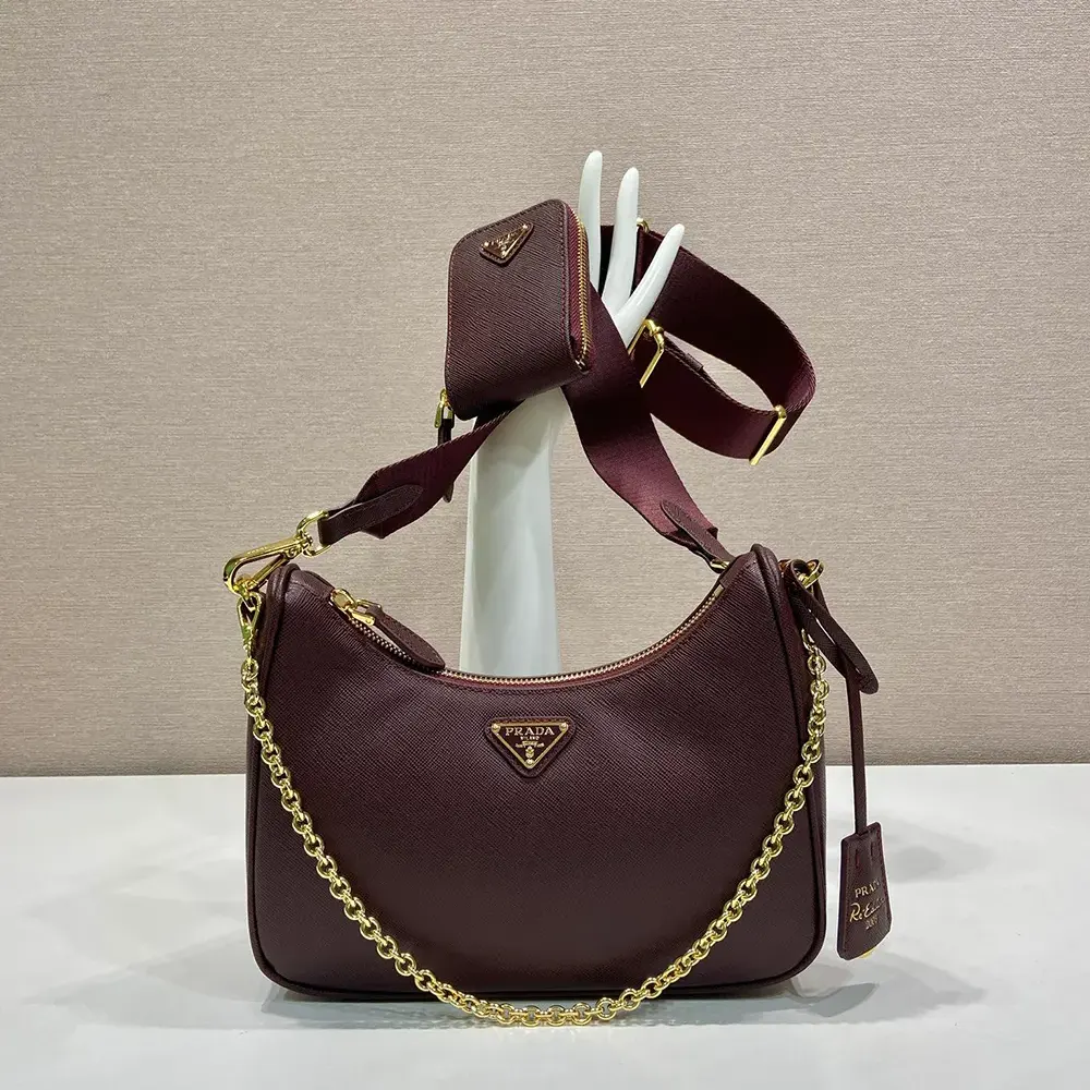Close-up of gold hardware and saffiano leather texture on Prada bag