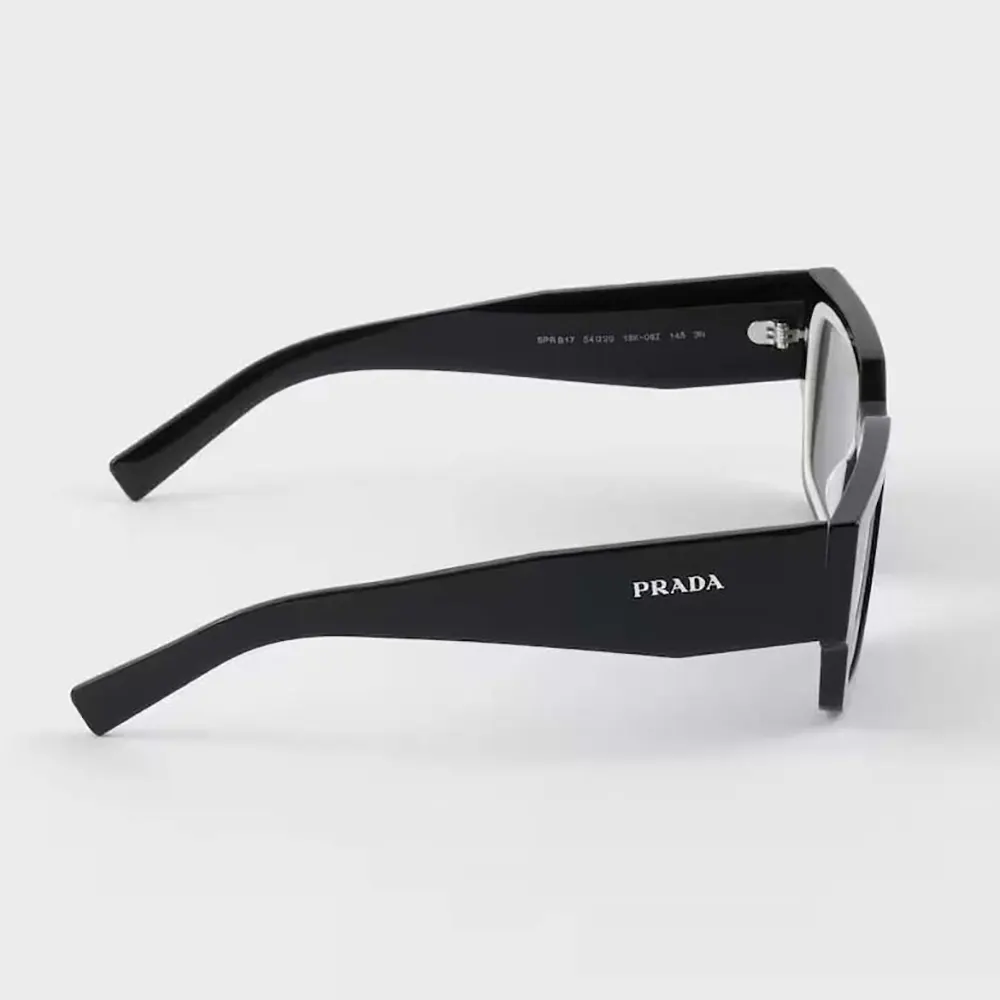 Side profile showing acetate frame of Prada Unisex Symbole Sunglasses