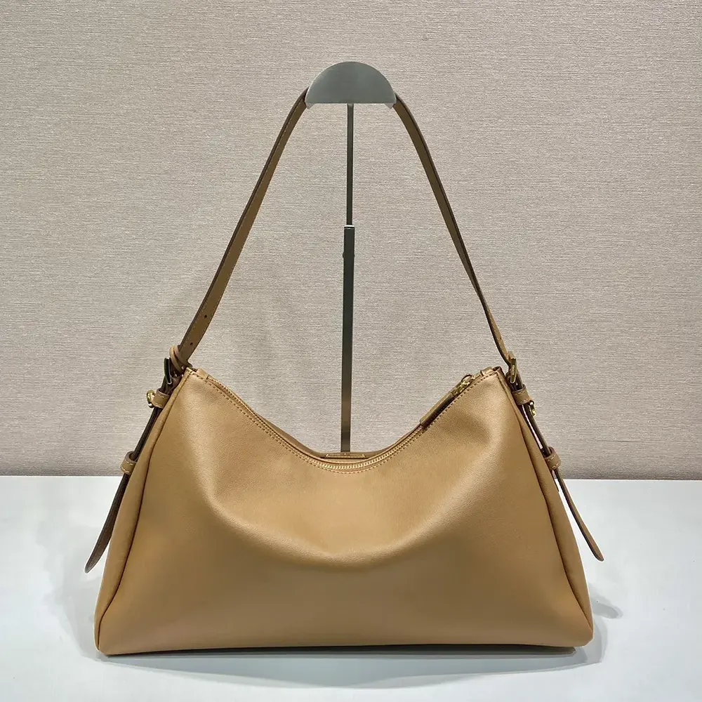 Side profile showing silhouette of Prada Women Aimée Large Leather Shoulder Bag-Brown
