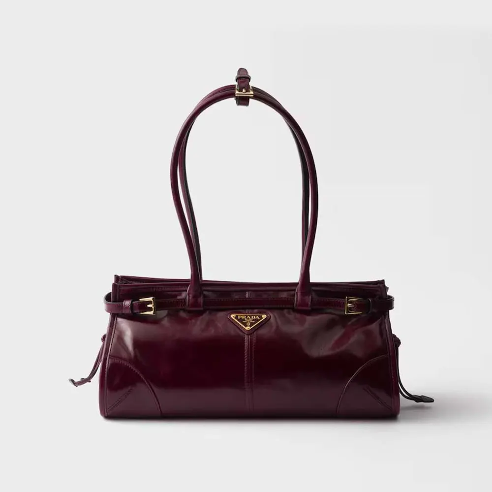 Front view of Prada Women Bonnie Medium Leather Handbag-Maroon with gold hardware