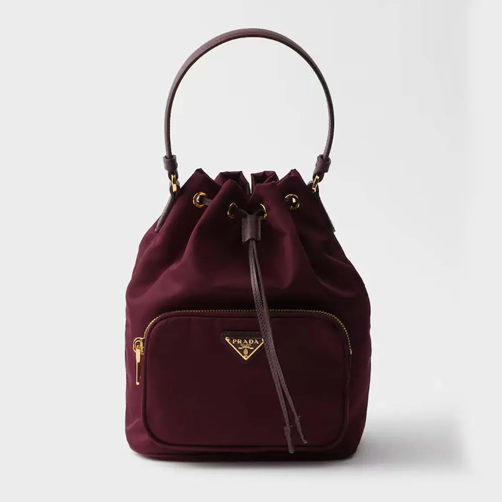 Front view of Prada Women Duet Re-Nylon Bucket Bag-Maroon showing silhouette