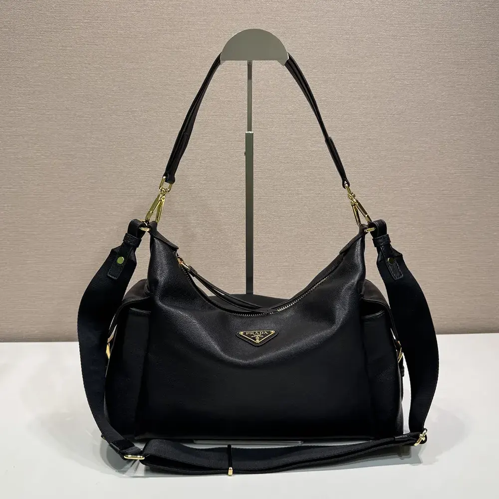 Close-up of zipper and silver-tone hardware on Prada Women Explore bag