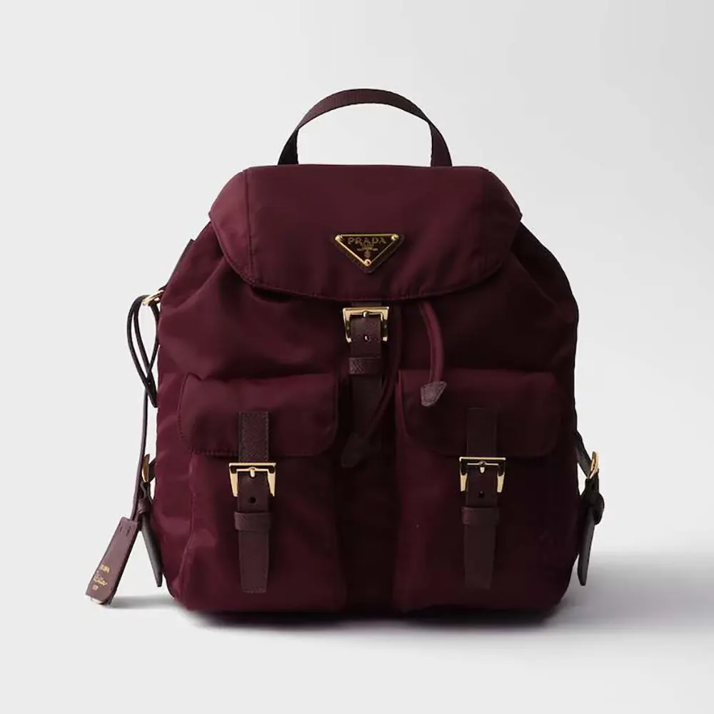 Front view of Prada Women Re-Edition 1978 Small Re-Nylon Backpack in maroon