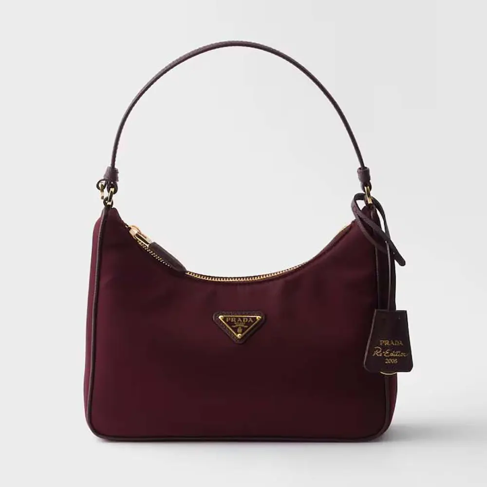 Front view of Prada Women Re-Edition 2005 Re-Nylon And Saffiano Mini Bag in maroon