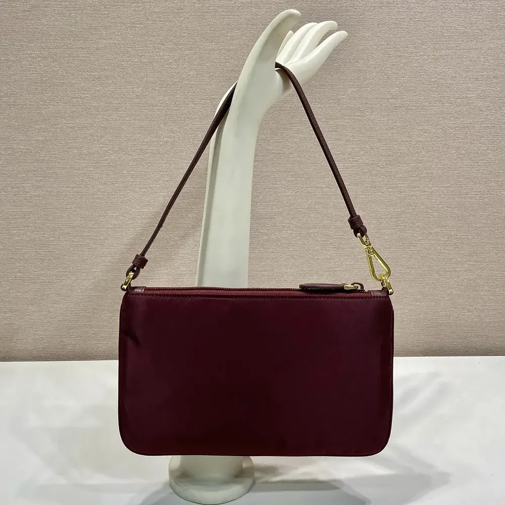 Side angle showing zipper closure on Prada Women Re-Nylon Pouch