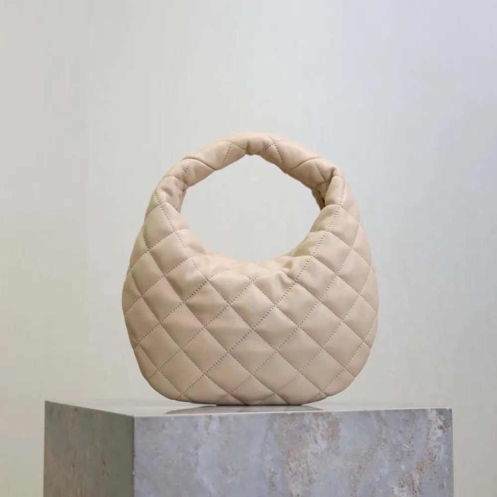 Side angle showing adjustable chain strap on Saint Laurent YSL bag