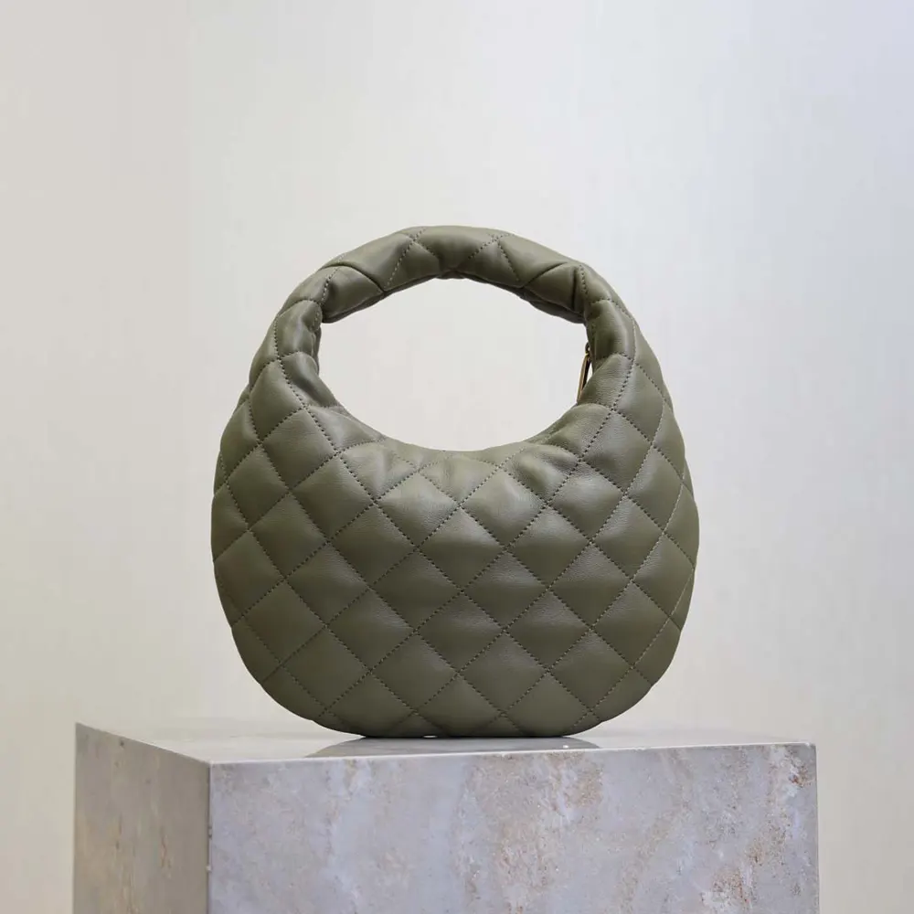 Side profile showing adjustable strap of Saint Laurent YSL Icarino bag
