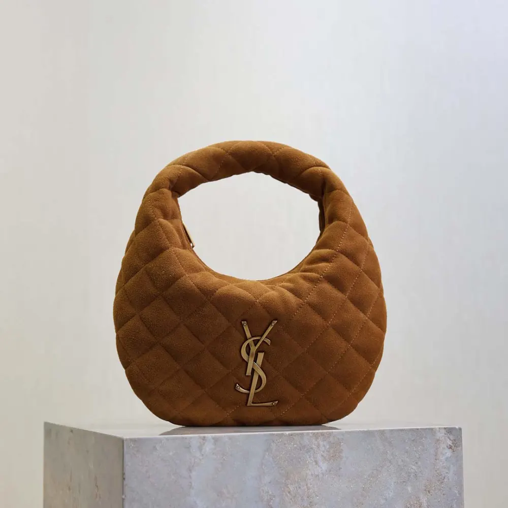 Close-up of quilted suede and YSL logo on Saint Laurent YSL Women Icarino