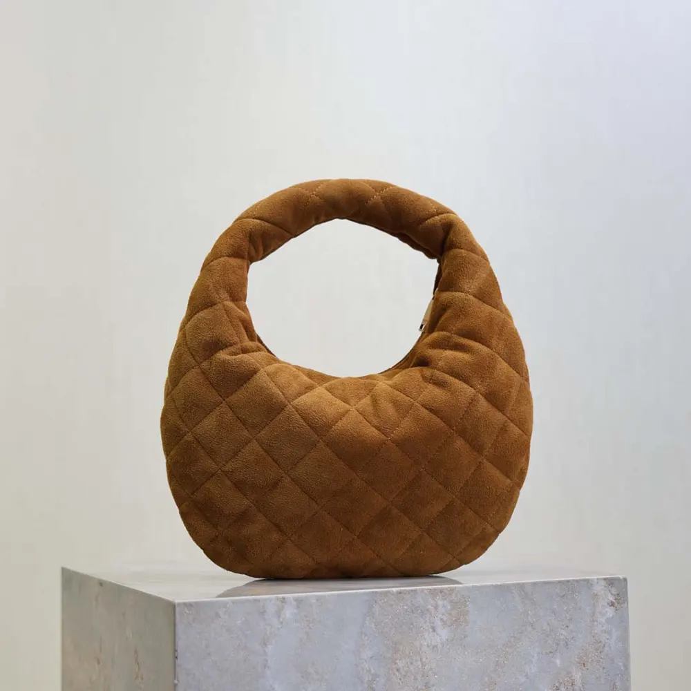 Side view highlighting gold hardware on Saint Laurent YSL Women Icarino bag