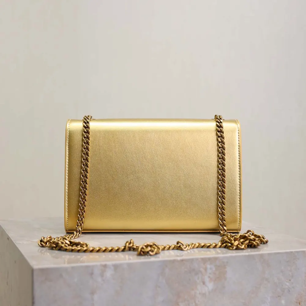 Side profile showing slim silhouette of Saint Laurent Kate Small bag