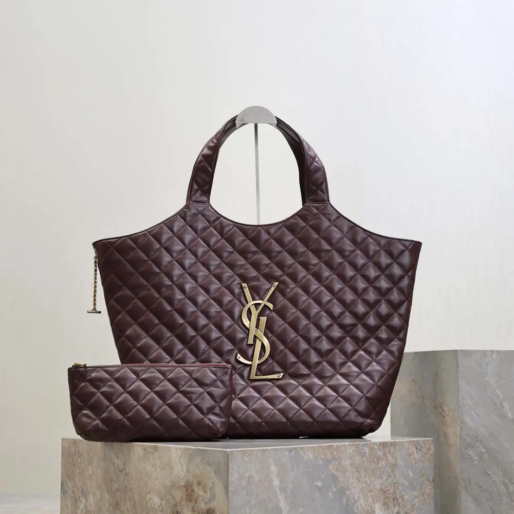 Close-up of gold YSL logo hardware on Saint Laurent YSL Women Large Icare bag