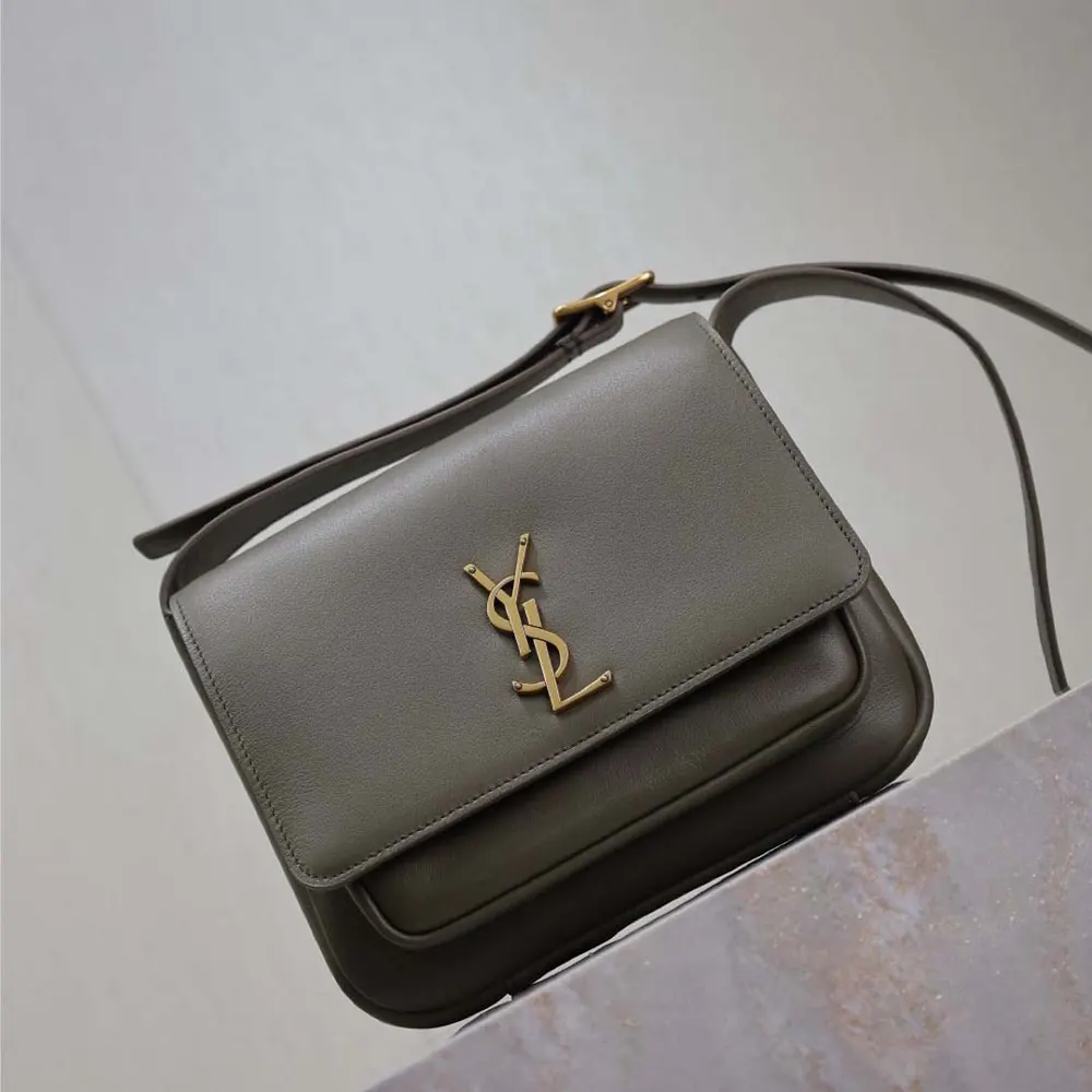 Side angle showing structured silhouette of Saint Laurent YSL Niki Satchel