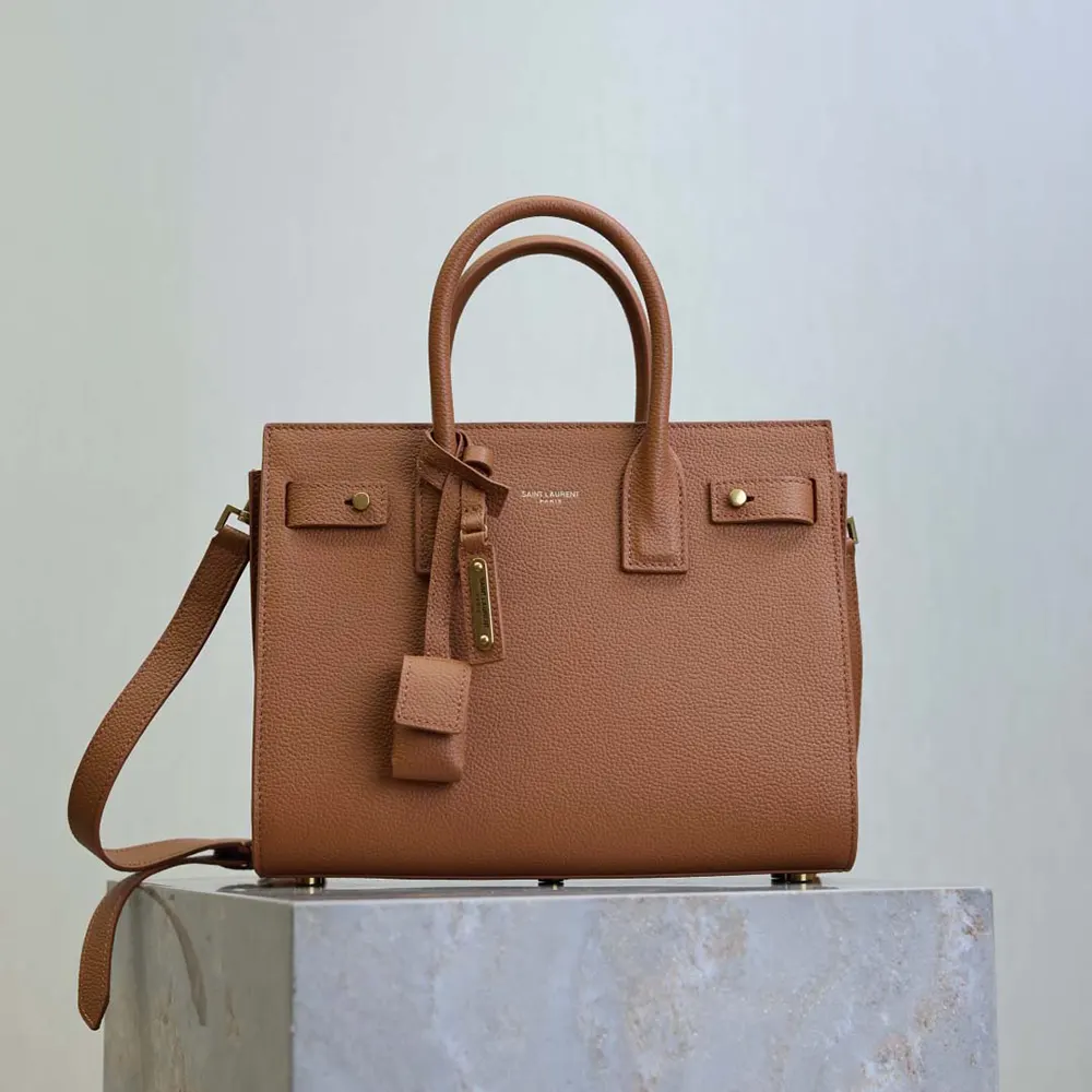 Close-up of gold YSL hardware on Saint Laurent YSL Women Small Sac De Jour