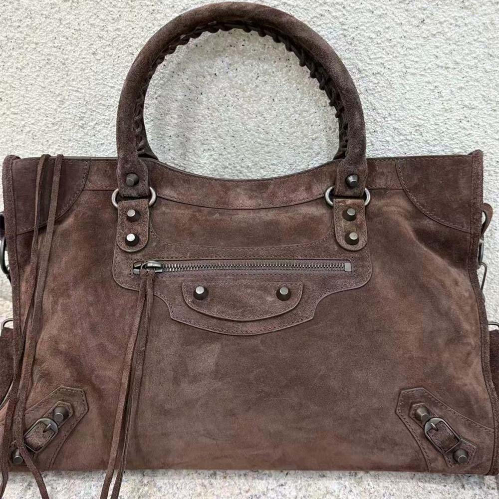 Close-up of antique gold hardware on Balenciaga Le City Bag Large