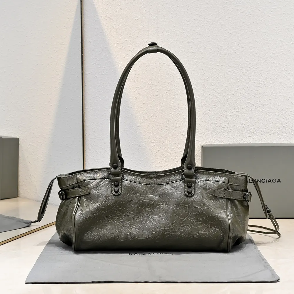 Side angle showing silhouette of Balenciaga Women Le City Bag East-West In Army Green