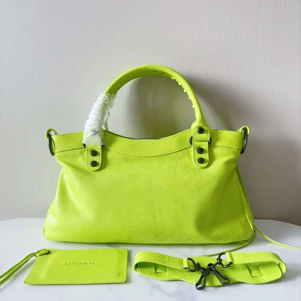 Side angle showing compact silhouette of Balenciaga Women Le City First Bag