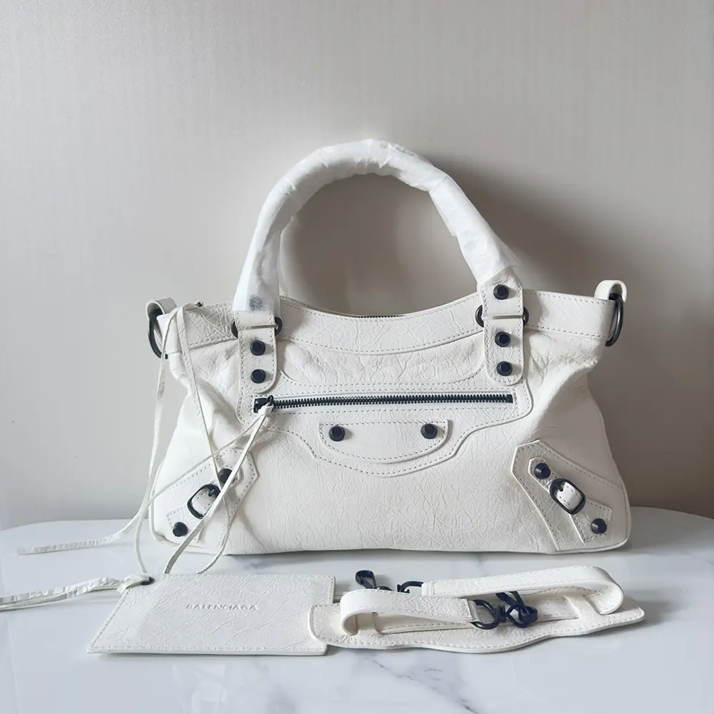 Close-up of matte black hardware and zipper on Balenciaga City First bag