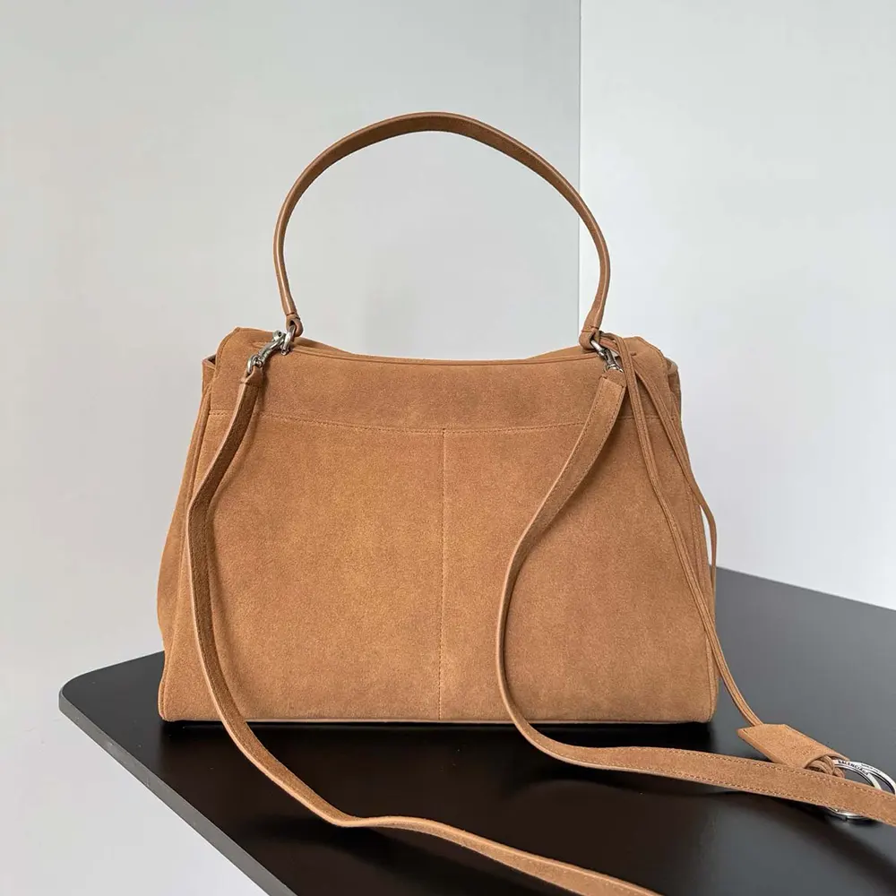 Side angle showing structured silhouette of Balenciaga Women Rodeo Handbag Medium