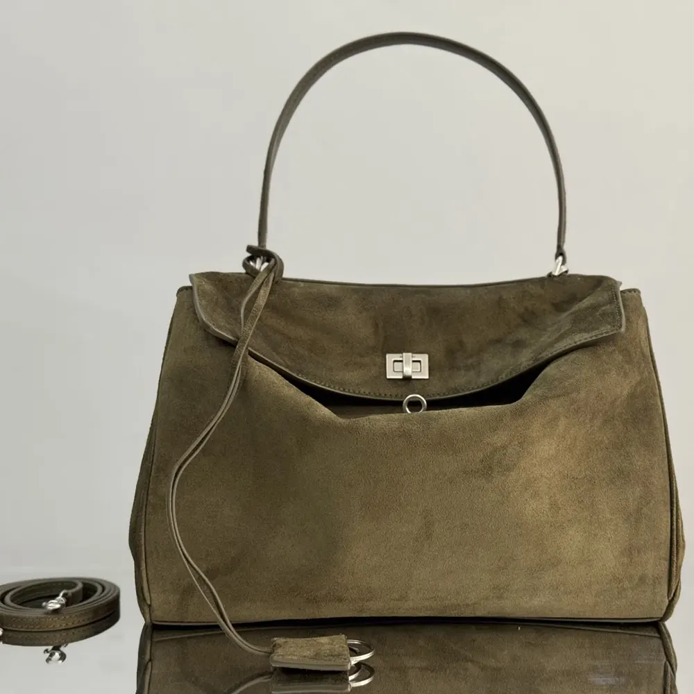 Close-up of gunmetal hardware and zip closure on Balenciaga Women Rodeo Handbag Medium