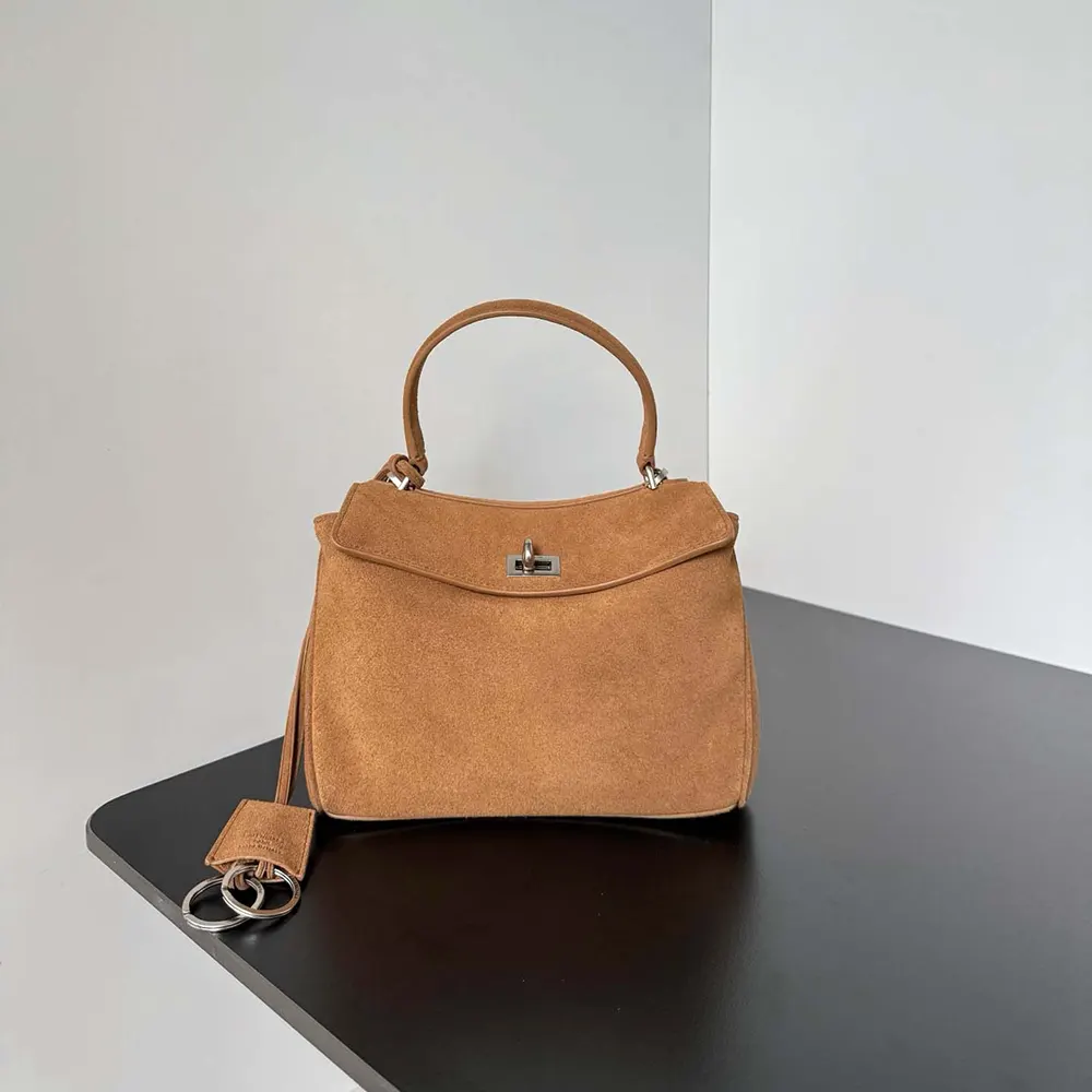 Close-up of gold studded hardware on Balenciaga Women Rodeo Handbag