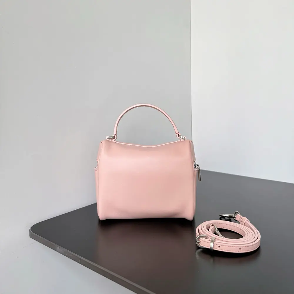 Side angle showing silver hardware and zip closure on Balenciaga Rodeo Vanity