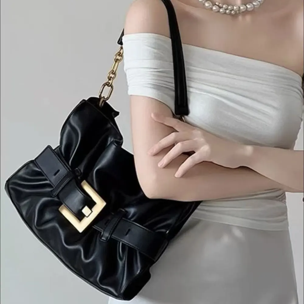 Side profile showing silhouette of Balmain Women Black Medium Anthem Bag Calfskin