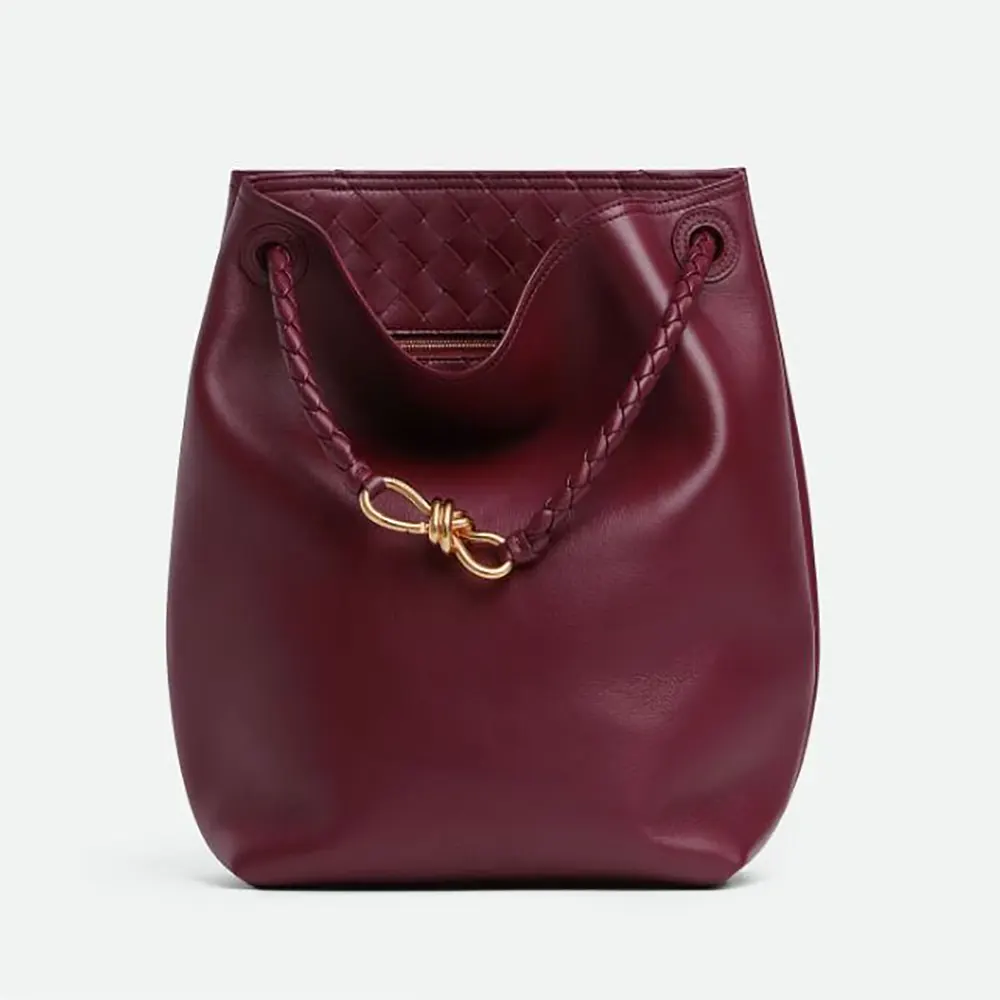 Front view of Bottega Veneta Women Andiamo Bucket in silky maroon leather