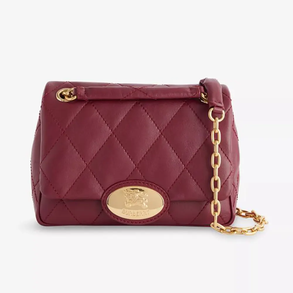 Front view of Burberry Women Small Strand Quilted Leather Shoulder Bag in red