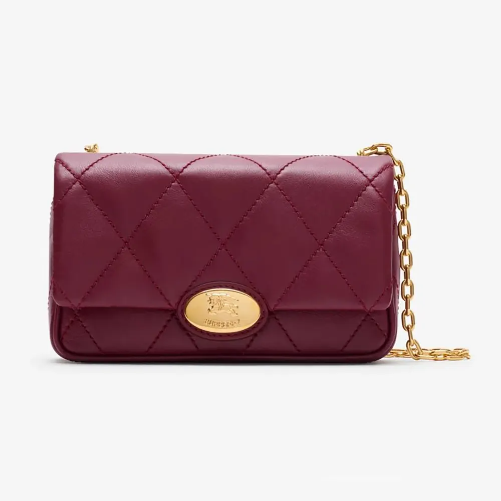 Front view of Burberry Women Strand Clutch in quilted burgundy leather