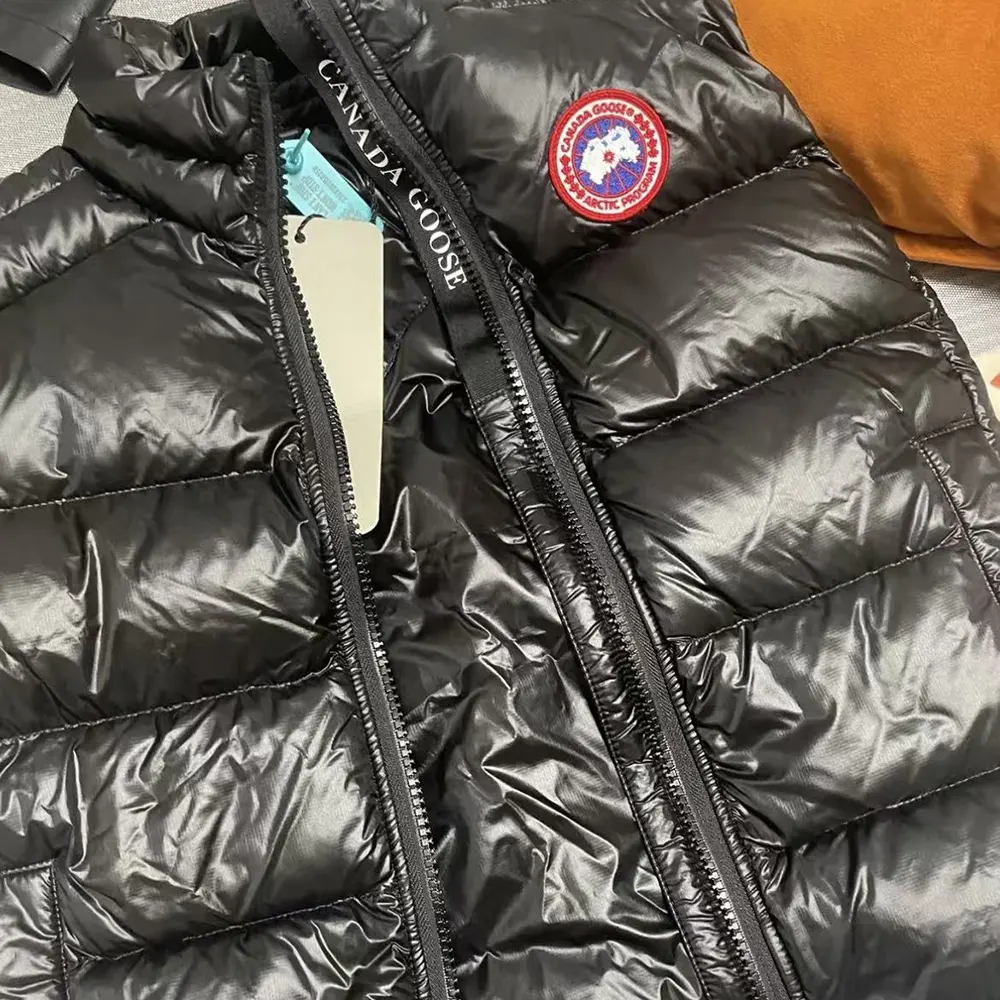 Side profile showing sleek fit of Canada Goose Crofton Vest in black