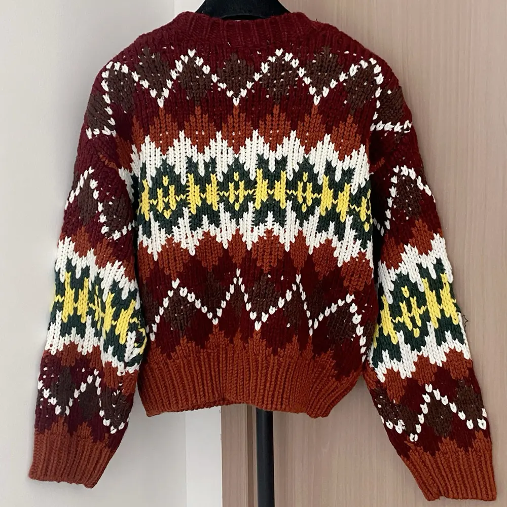 Side angle showing silhouette of Celine Women Crewneck Sweater wool