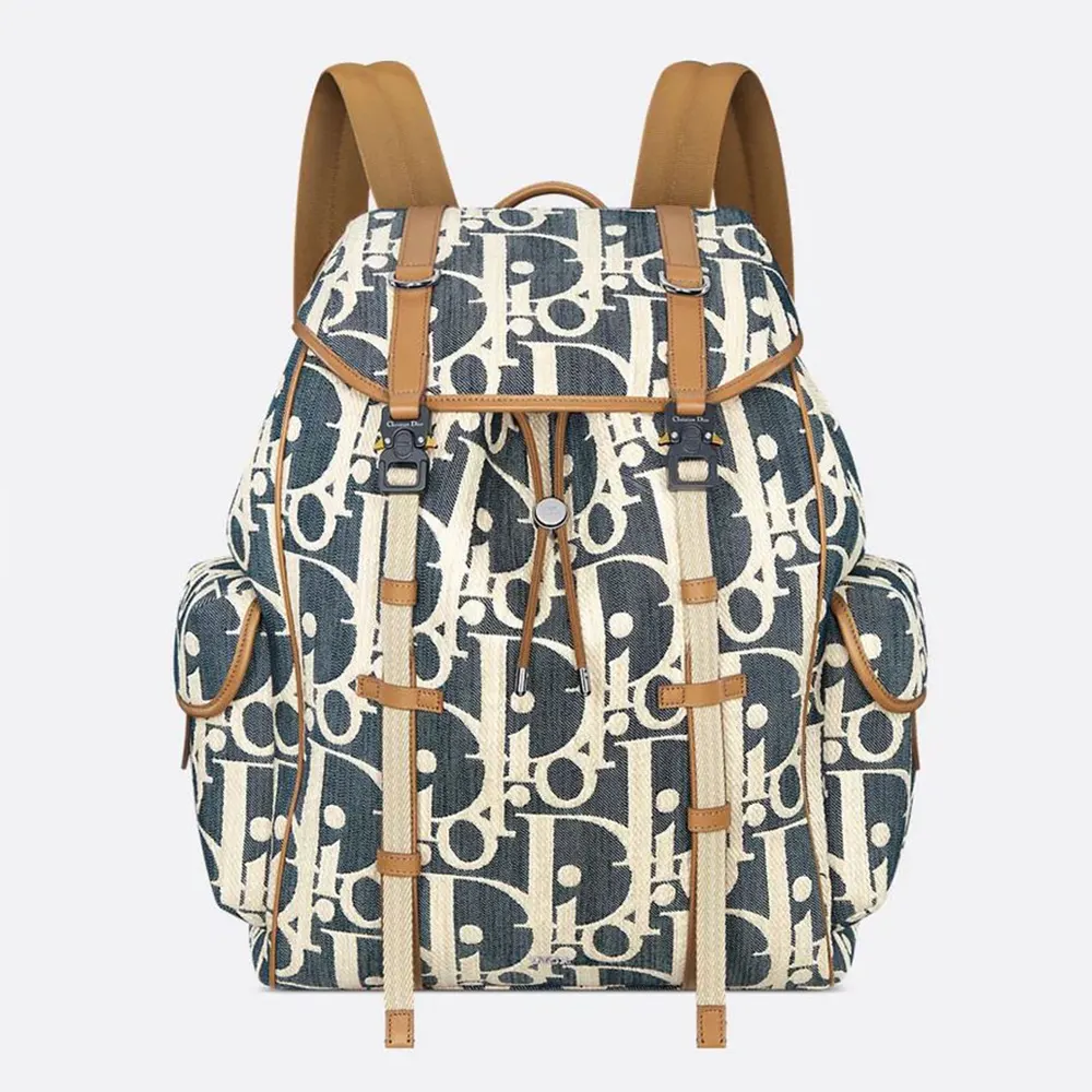 Front view of Dior Men Hit the Road Backpack with flap and raffia-effect denim