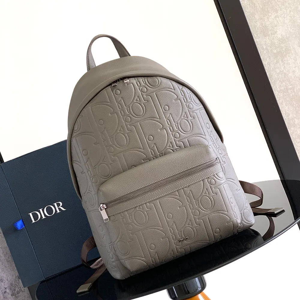 Close-up of gray Dior Gravity leather texture on backpack