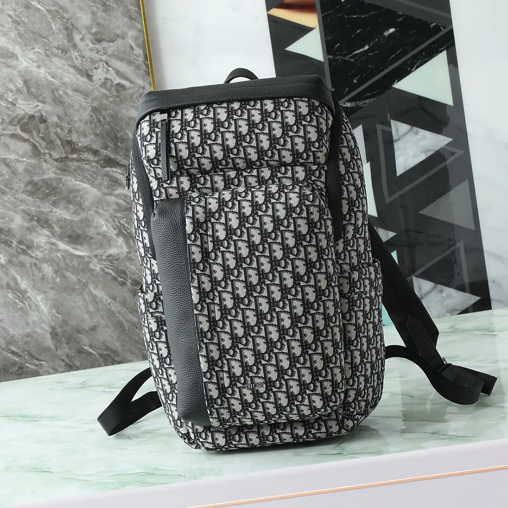 Close-up of beige Dior Oblique jacquard with black calfskin accents