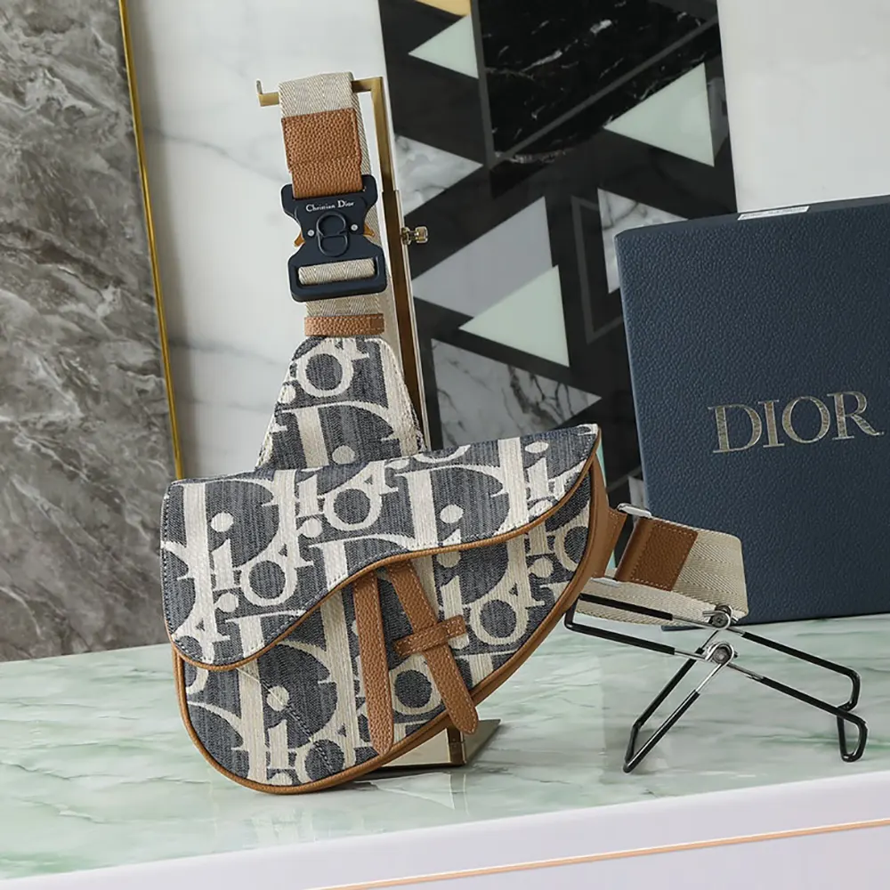 Close-up of raffia-effect texture and silver Dior logo on bag flap