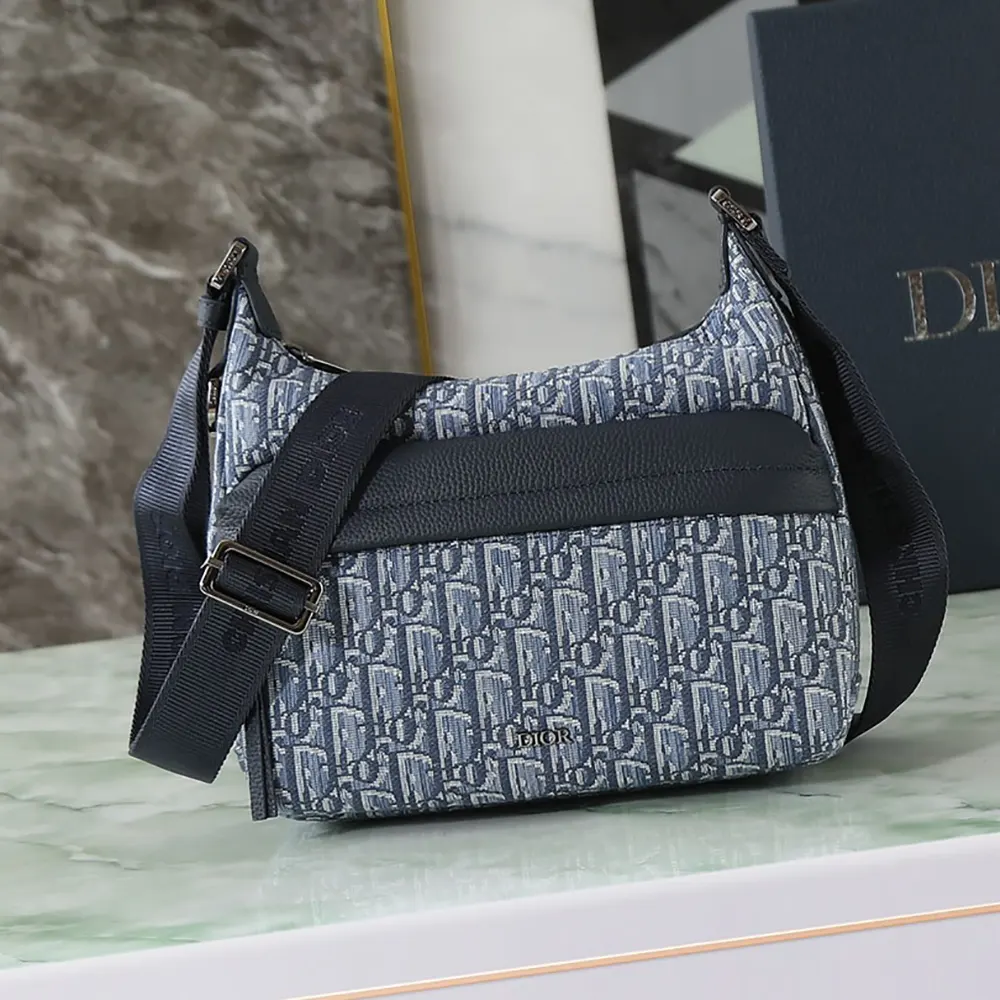 Close-up of blue grained calfskin and silver hardware on Dior bag