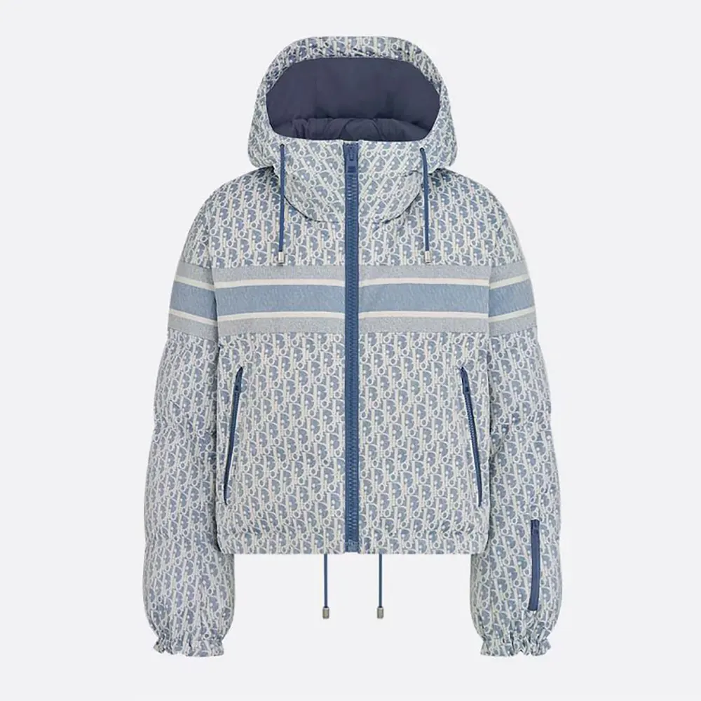 Front view of Dior Men DiorAlps Cropped Puffer Jacket with Hood in blue and white