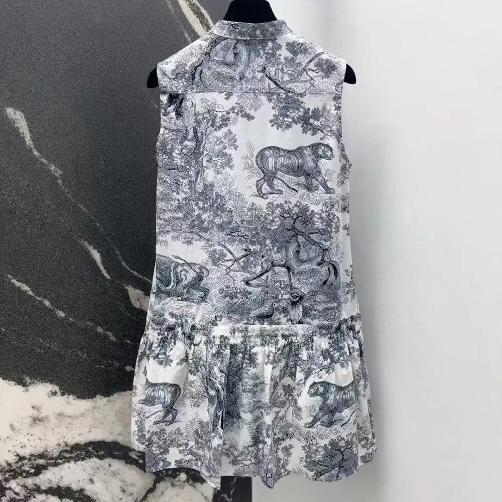 Back angle showcasing silhouette of Dior Women Dioriviera Ruffled Dress white