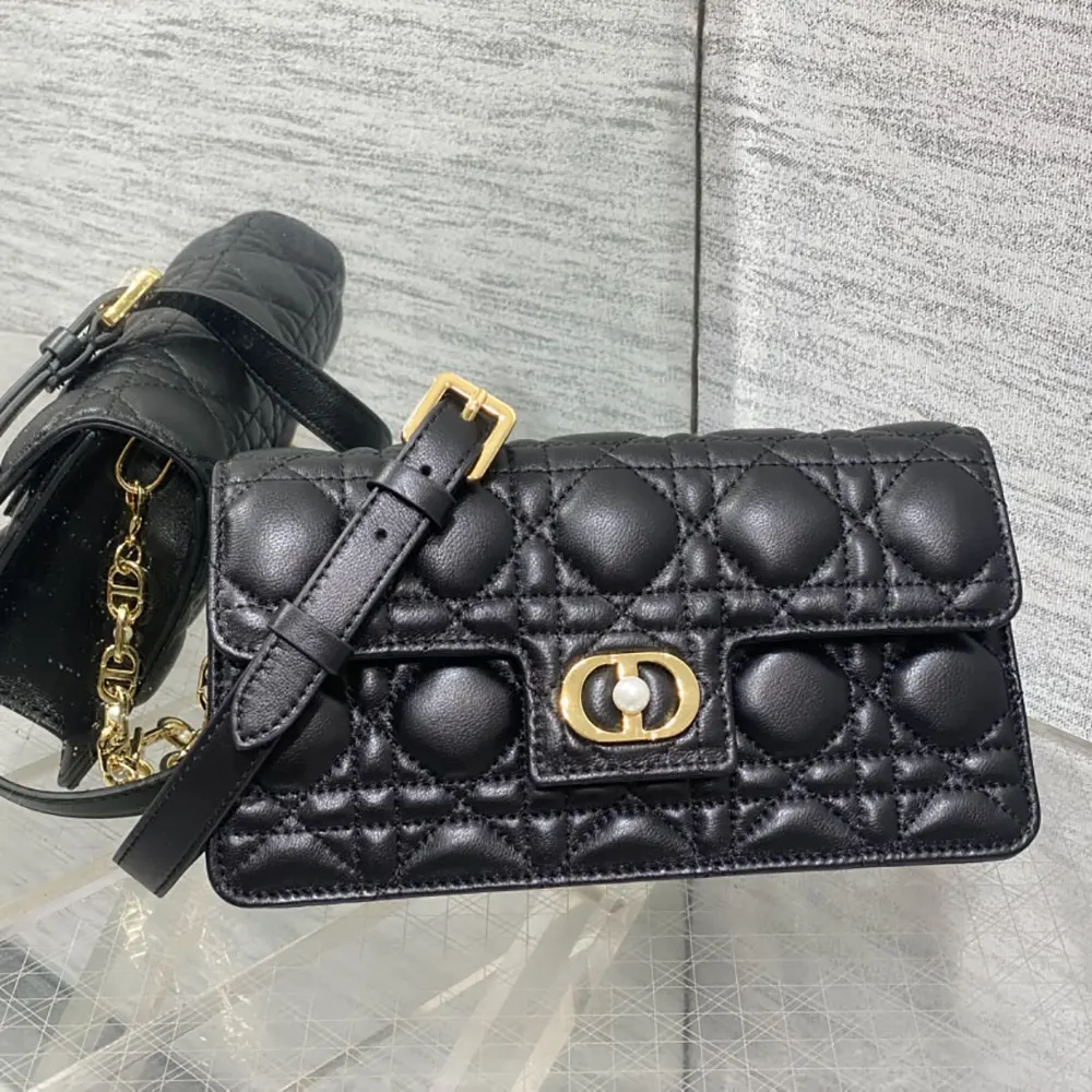 Side angle showing silver hardware on Dior Women Jolie Mini Bag