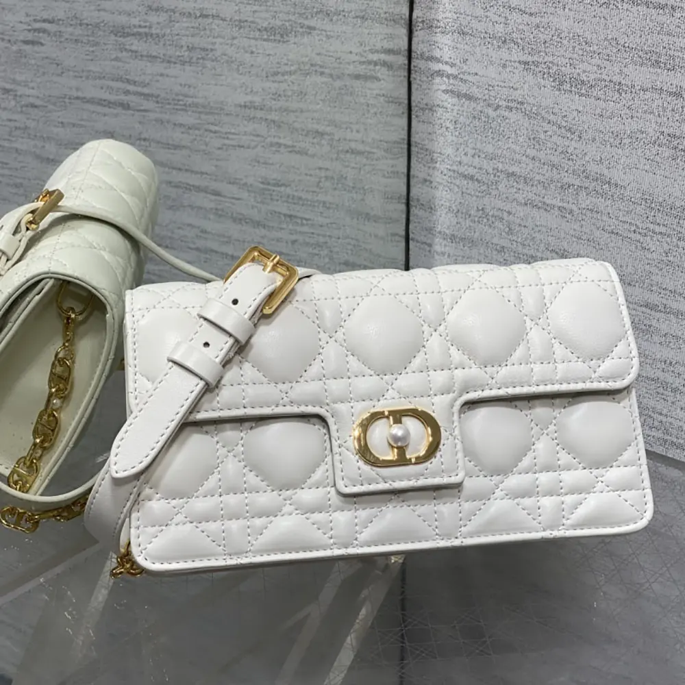 Close-up of Dior Women Jolie Mini Bag Latte Cannage Lambskin gold clasp detail