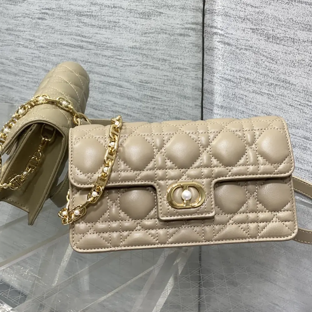 Side profile showing slim silhouette of Dior Women Jolie Mini Bag Powder Beige