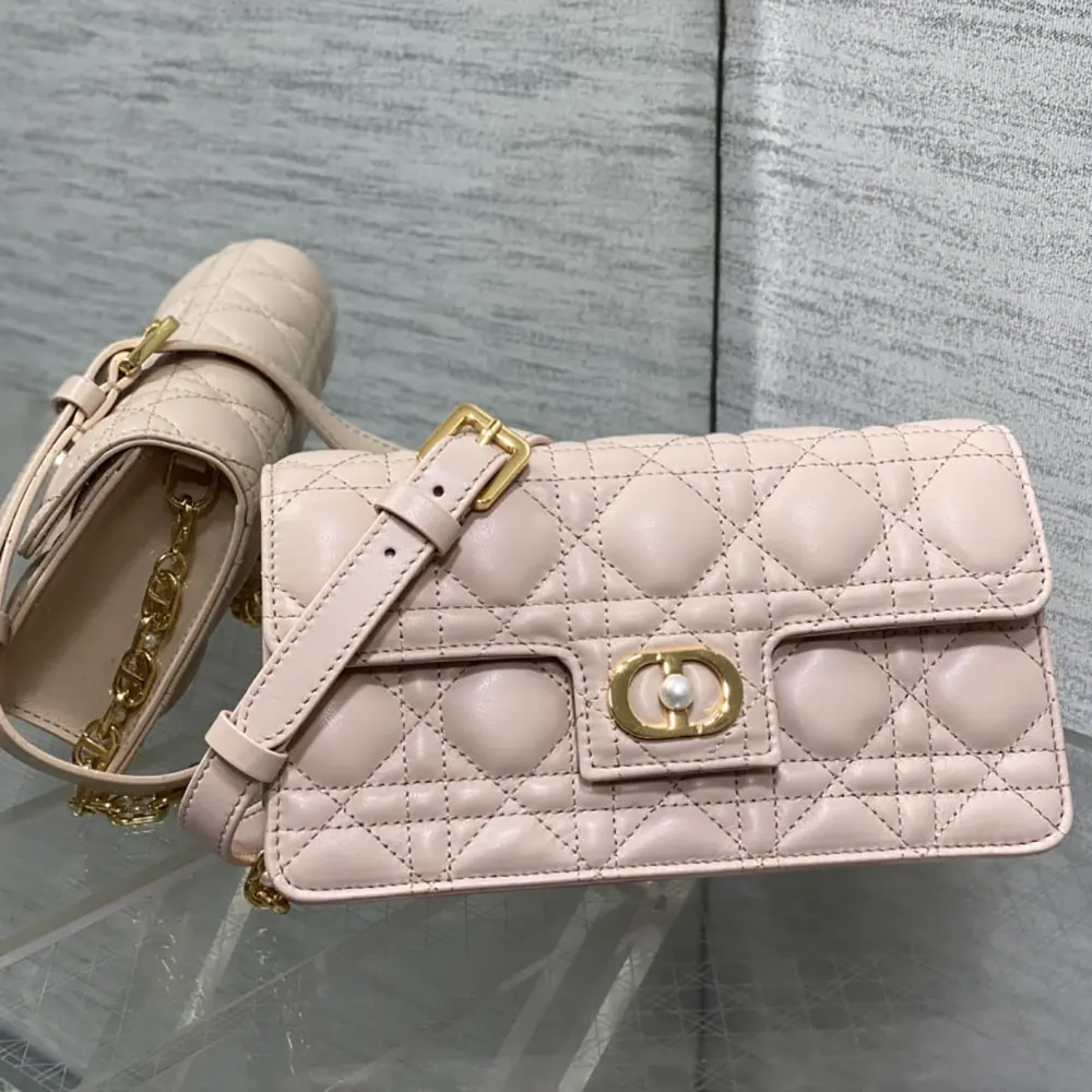 Side angle showing silhouette of Dior Women Jolie Mini Bag Powder Pink