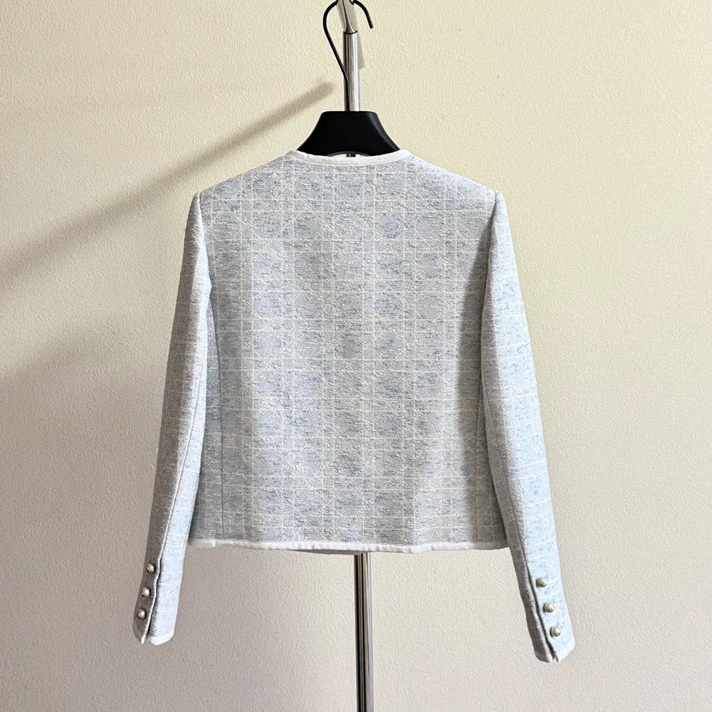 Side angle of Dior Women Macrocannage Cropped Jacket showing tailored fit and buttons
