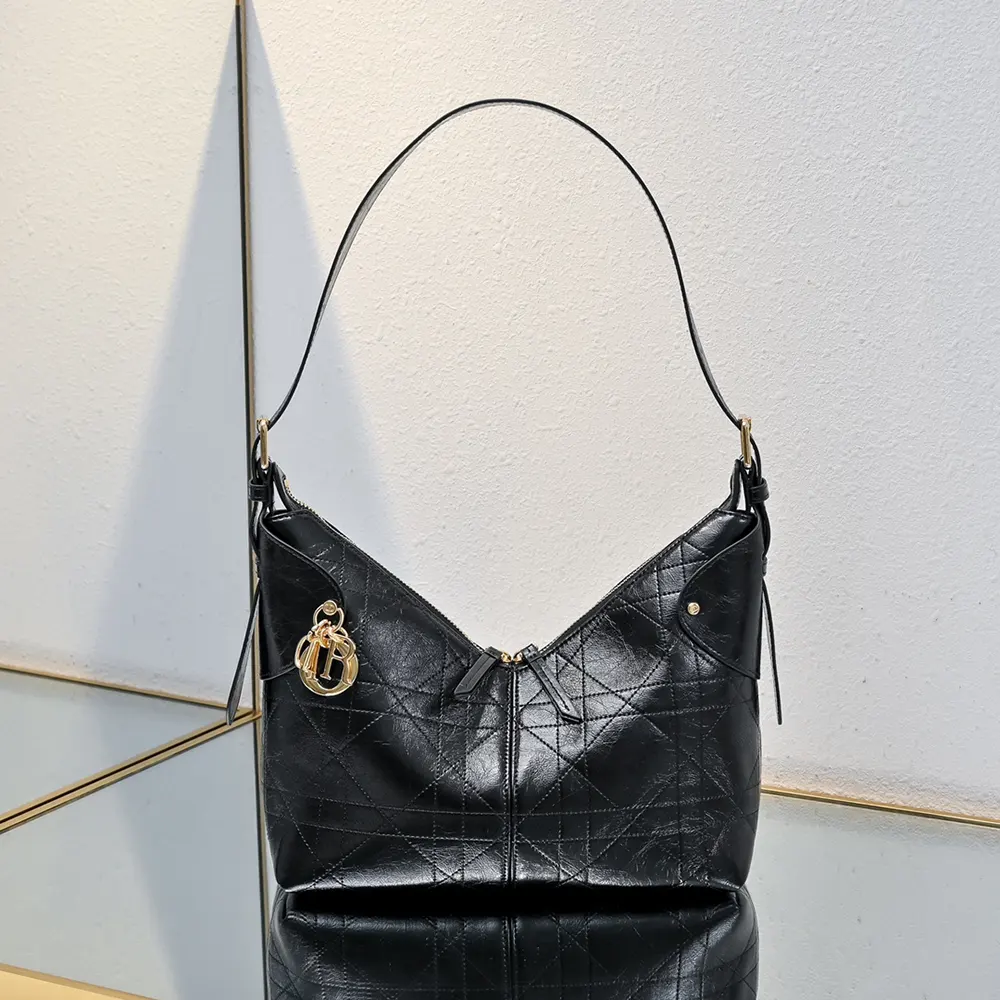 Close-up of Dior signature silver hardware and flap closure detail