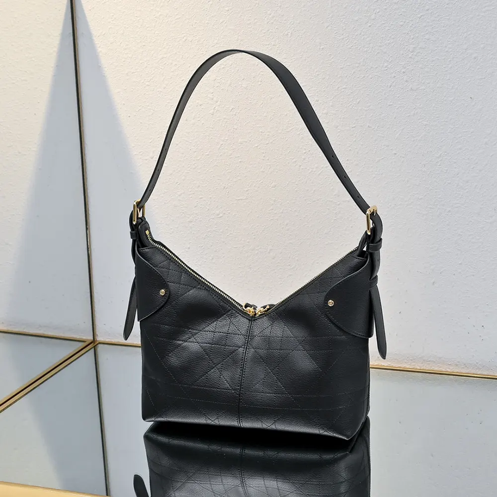 Side angle showing silhouette of Dior Women Small Dior Voyage Bag Black