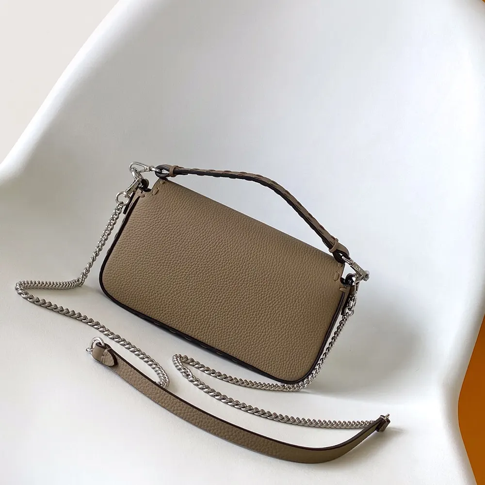 Side angle showing silver hardware on Fendi Women Baguette® Bag