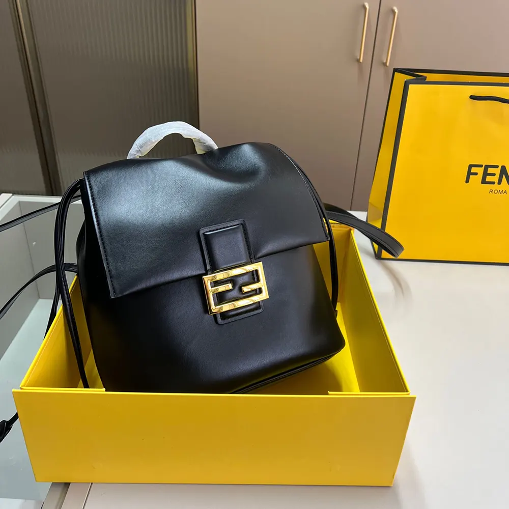 Side angle showing adjustable straps of Fendi Women Cappuccino Black Leather Backpack
