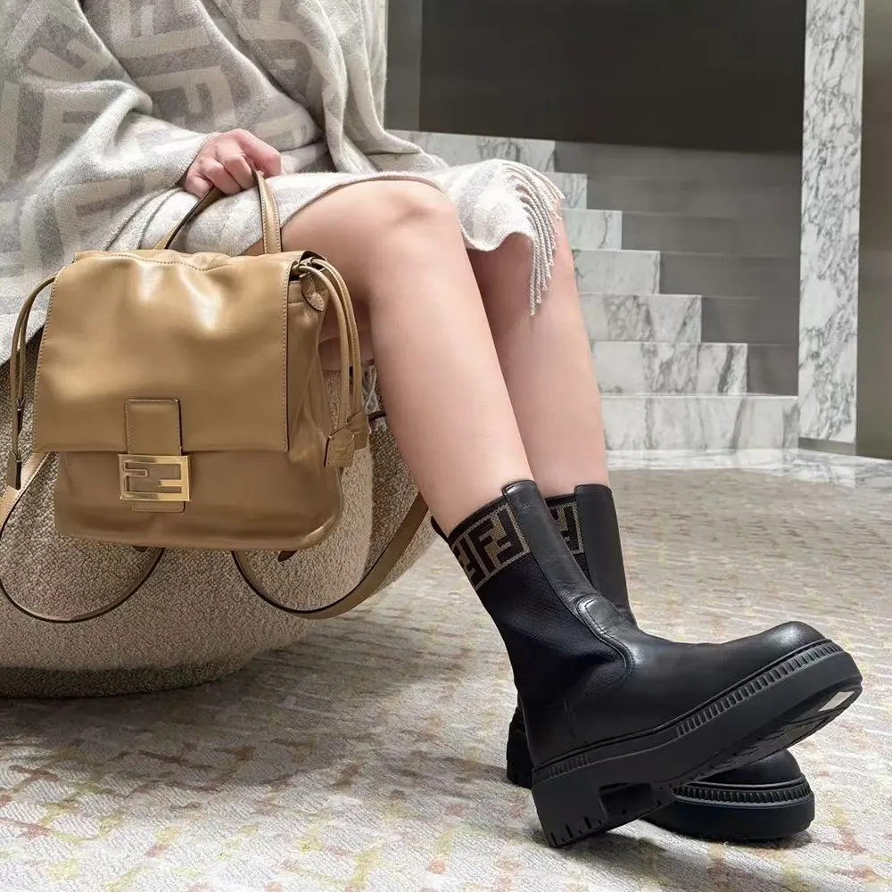 Side angle showing adjustable straps on Fendi Women Cappuccino Brown Leather Backpack