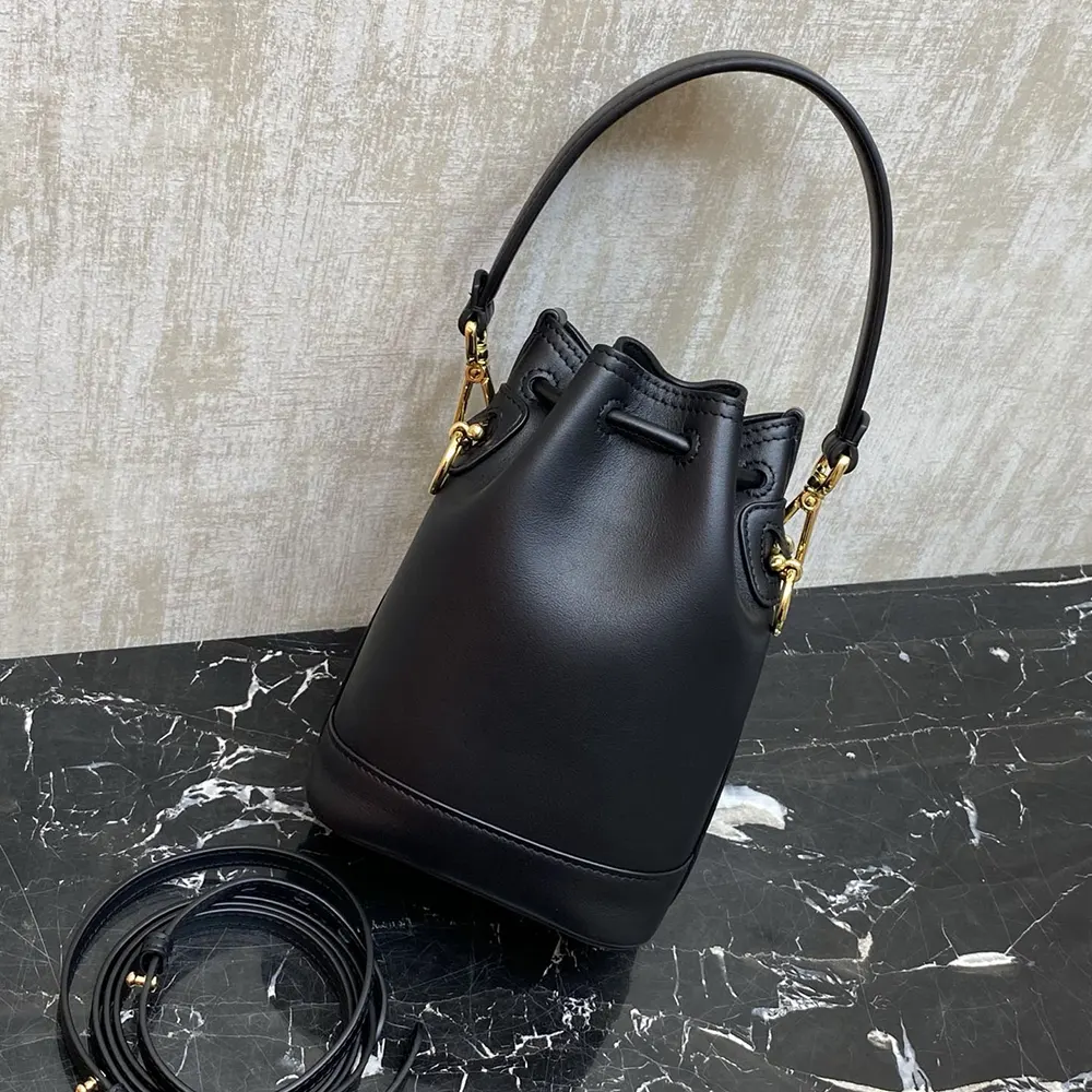 Side angle showing compact silhouette of Fendi Women Mon Tresor mini-bag